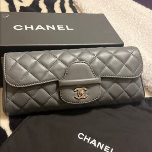 CHANEL Quilted Silver Clutch